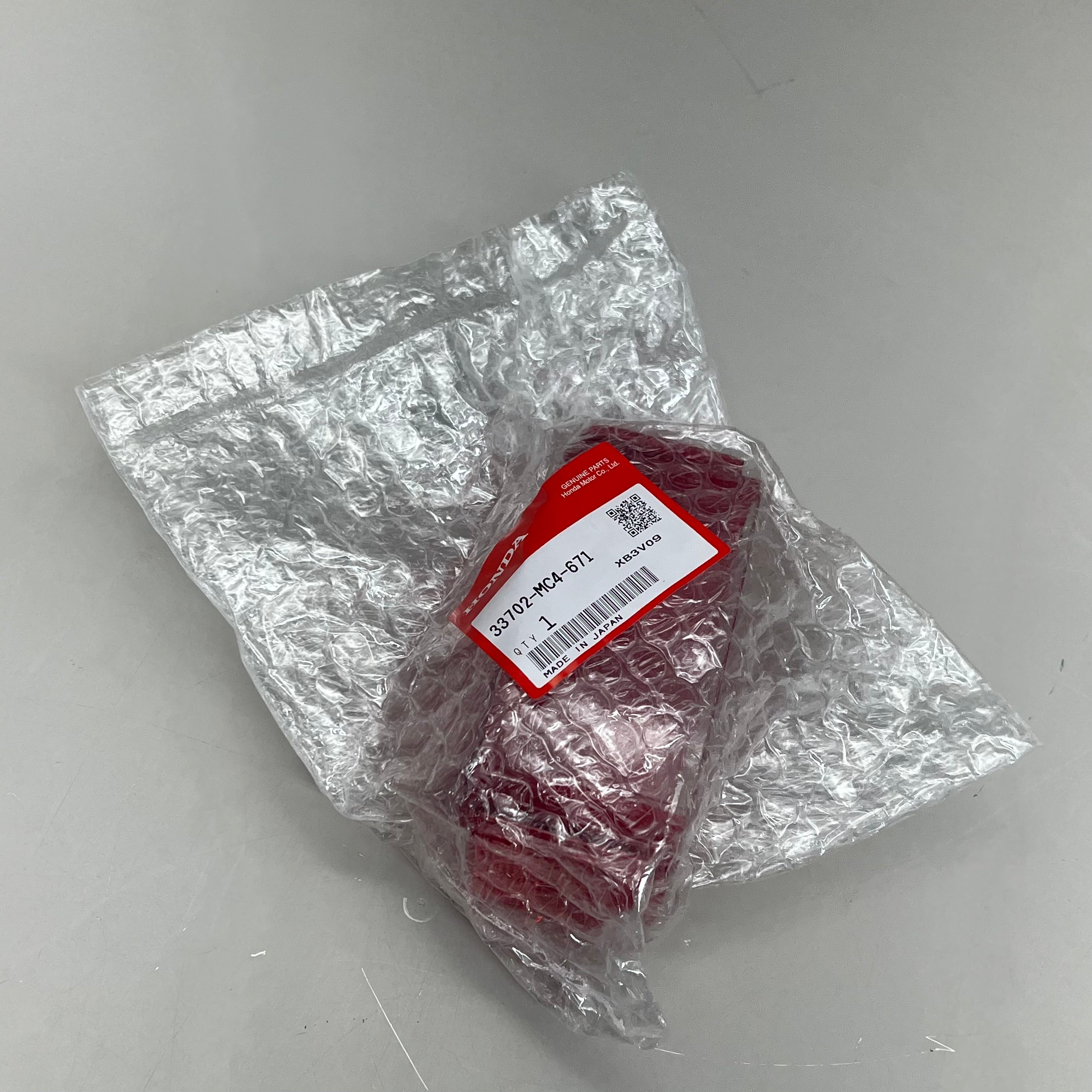 HONDA Tail Light Lens CRF230L Magna 750 Rebel 300 Genuine OEM Red 33702-MC4-671